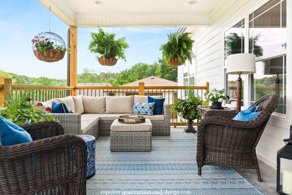 superior construction design new build traditional white blue elegant lake home outdoor living area
