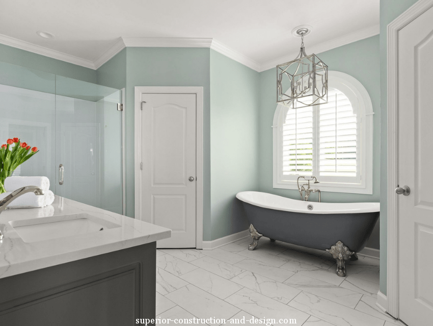 master bathroom suite modern traditional chandelier sea foam green walls standing tub plantation shutters tn