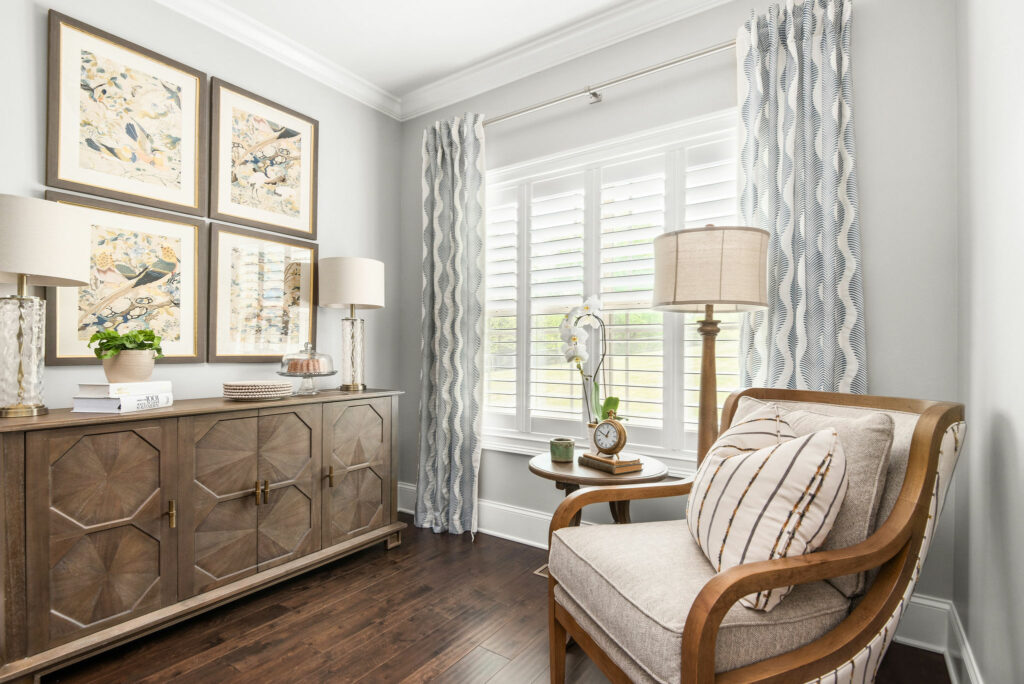 Nancy Meyers aesthetic reading nook with side table and large windows